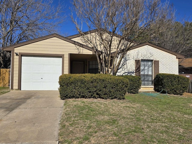 single story home with a garage and a front lawn