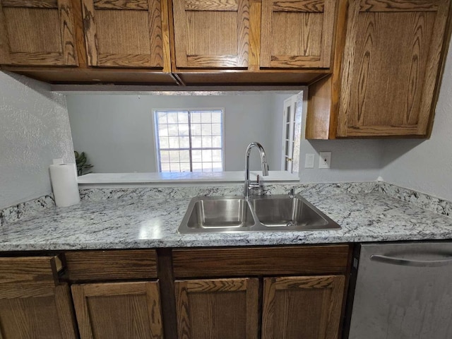 kitchen featuring sink and dishwasher