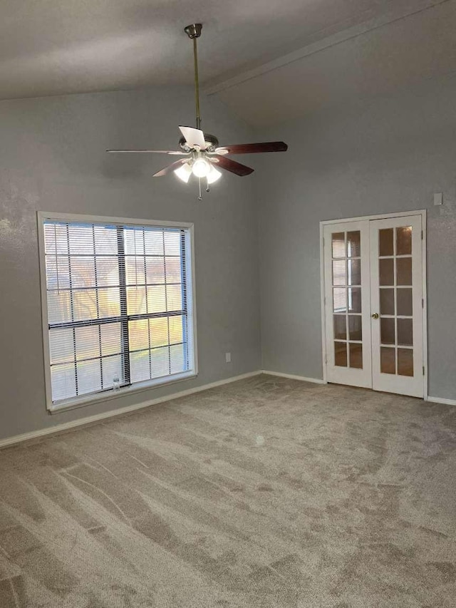 unfurnished room featuring carpet, ceiling fan, and french doors