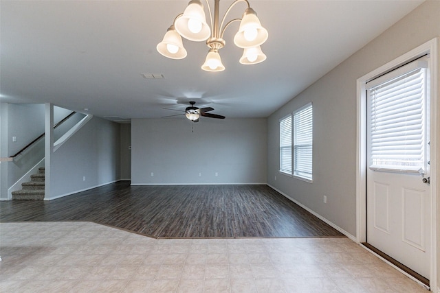 unfurnished living room featuring ceiling fan