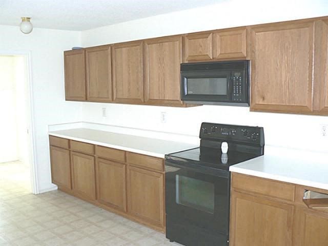 kitchen with black appliances