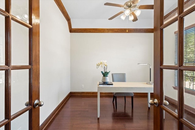 office space featuring french doors, ceiling fan, dark hardwood / wood-style flooring, and crown molding