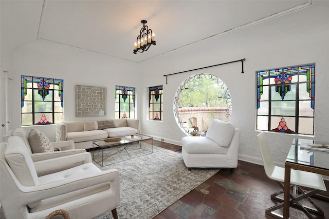 living room featuring a notable chandelier