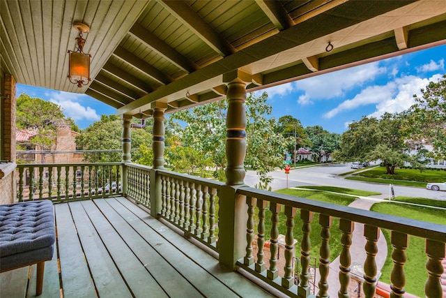 wooden terrace featuring a porch