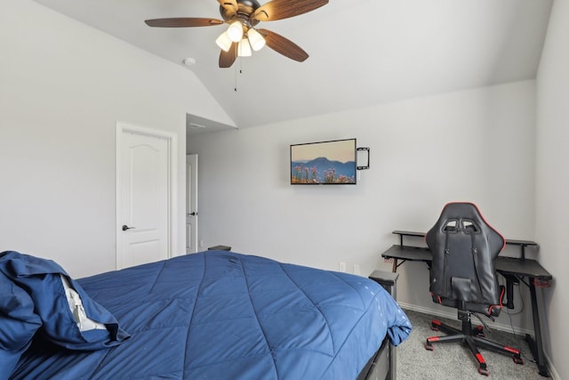 carpeted bedroom featuring vaulted ceiling, a ceiling fan, and baseboards