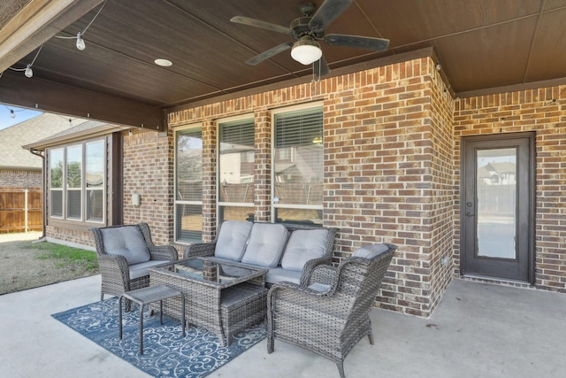 view of patio / terrace featuring a ceiling fan, fence, and an outdoor hangout area