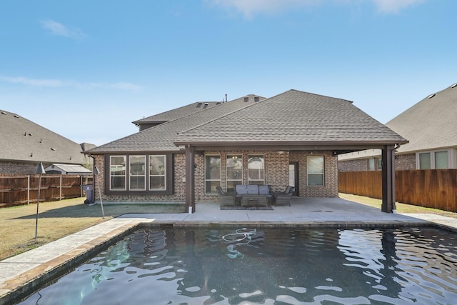 view of pool featuring a patio area, a fenced backyard, and a fenced in pool