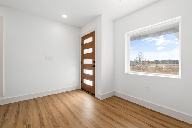 foyer with light wood-type flooring