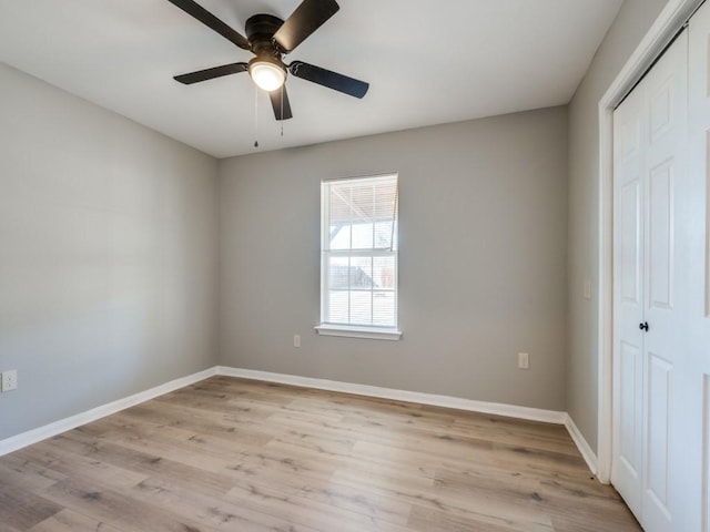 unfurnished bedroom featuring a closet, ceiling fan, and light hardwood / wood-style floors