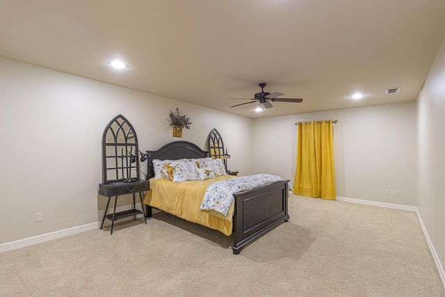 carpeted bedroom featuring ceiling fan