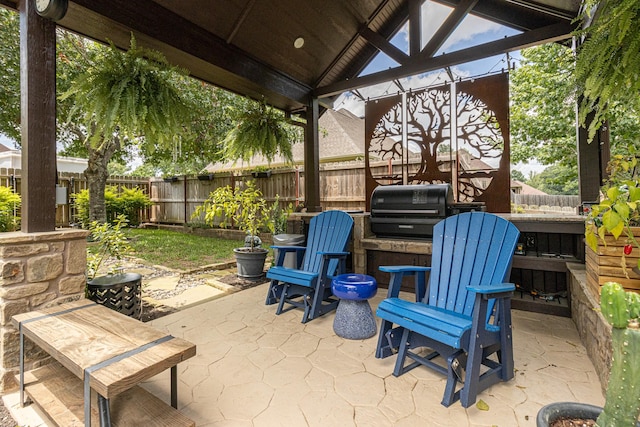 view of patio featuring a grill