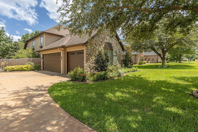 view of property exterior with a yard and a garage