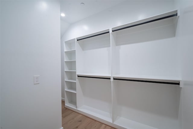 walk in closet featuring light hardwood / wood-style flooring