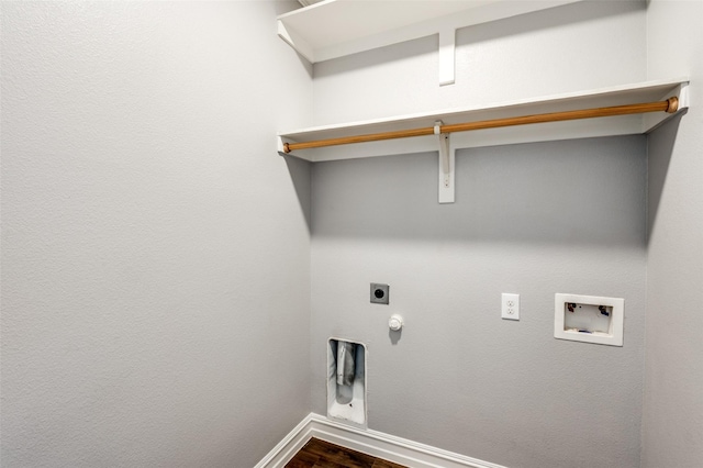 clothes washing area with washer hookup, dark hardwood / wood-style flooring, hookup for a gas dryer, and electric dryer hookup