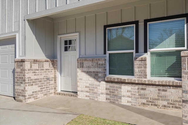 entrance to property featuring a garage