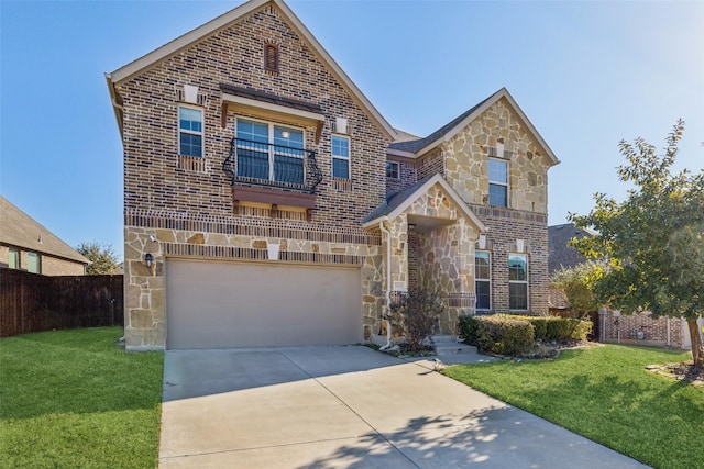 view of front of property featuring a garage and a front yard