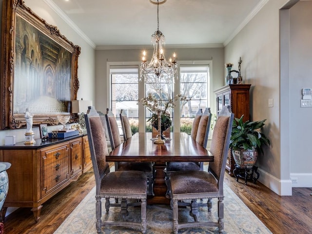 dining area with crown molding, dark hardwood / wood-style floors, and a chandelier