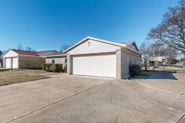 view of property exterior with a garage