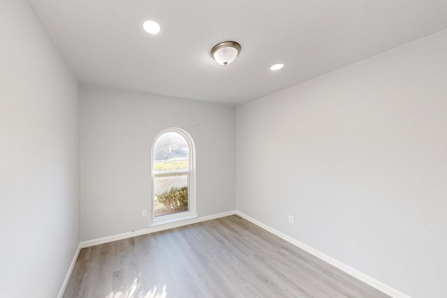 unfurnished room featuring light hardwood / wood-style flooring