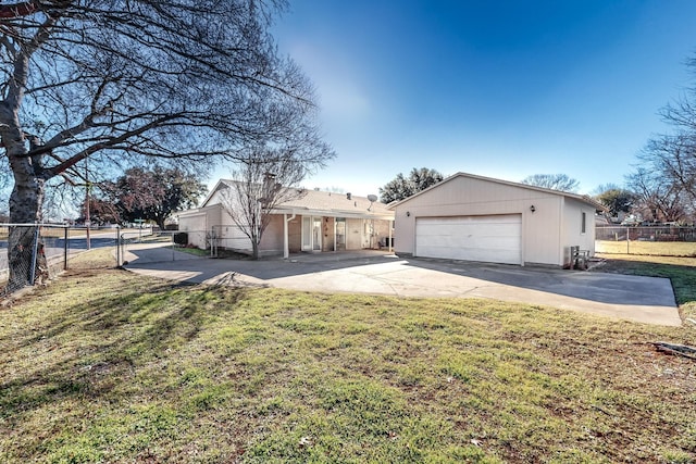 single story home with a garage and a front lawn