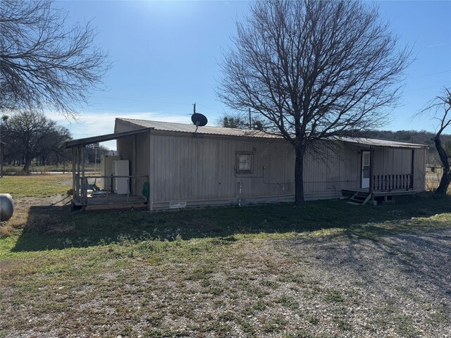 view of outdoor structure with a yard