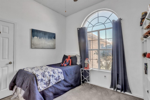 bedroom featuring carpet