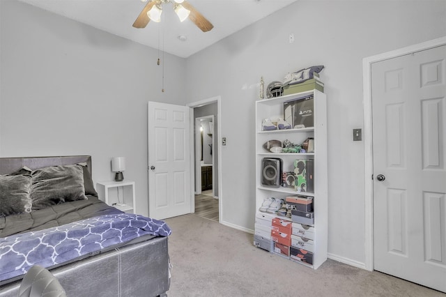 carpeted bedroom featuring ceiling fan