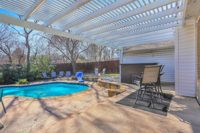 view of swimming pool featuring a pergola and a patio area