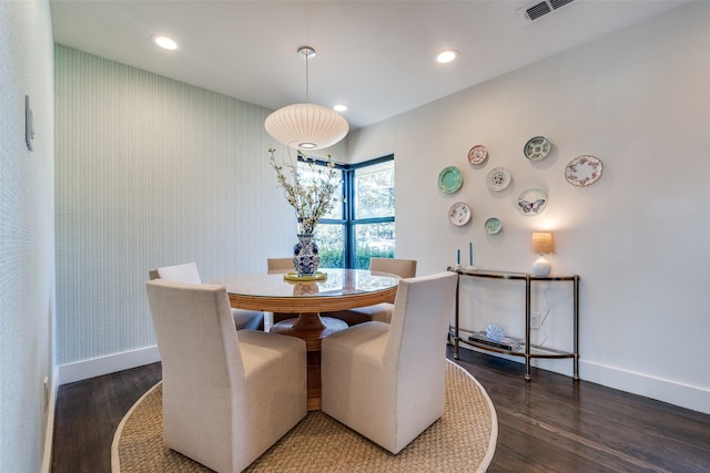 dining room featuring dark hardwood / wood-style flooring