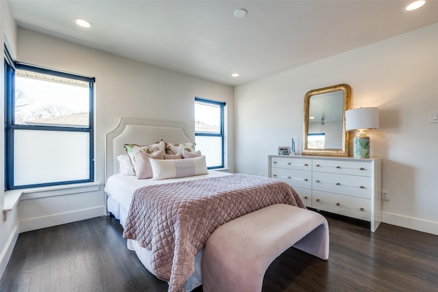 bedroom featuring dark wood-type flooring