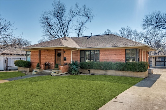 ranch-style house with a front lawn