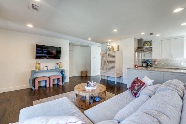 living room featuring dark hardwood / wood-style floors