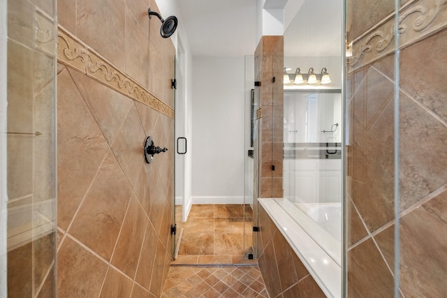 bathroom with separate shower and tub