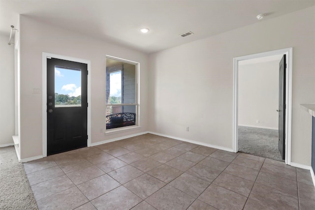 view of tiled foyer entrance