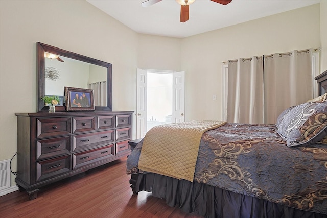 bedroom featuring ceiling fan and dark hardwood / wood-style floors