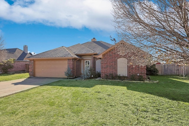 single story home featuring a garage and a front lawn