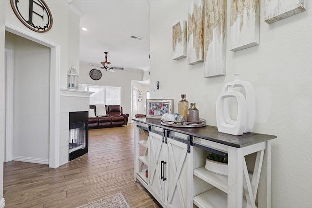 hall featuring ornamental molding