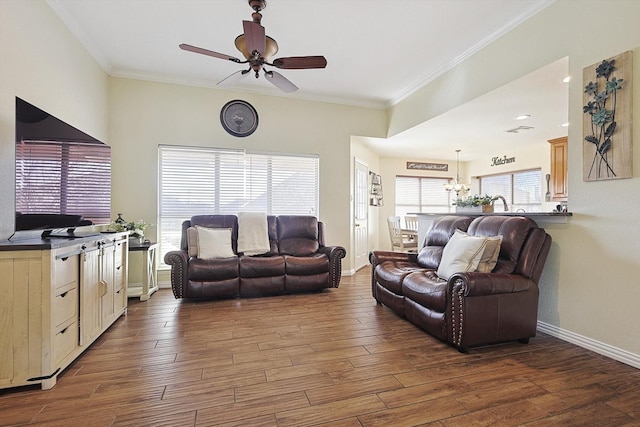 living room featuring crown molding, dark wood-type flooring, and ceiling fan