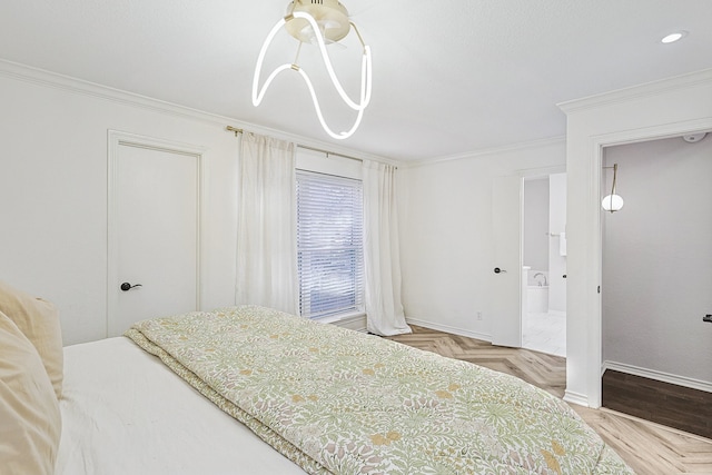 bedroom featuring recessed lighting, baseboards, ensuite bathroom, and crown molding