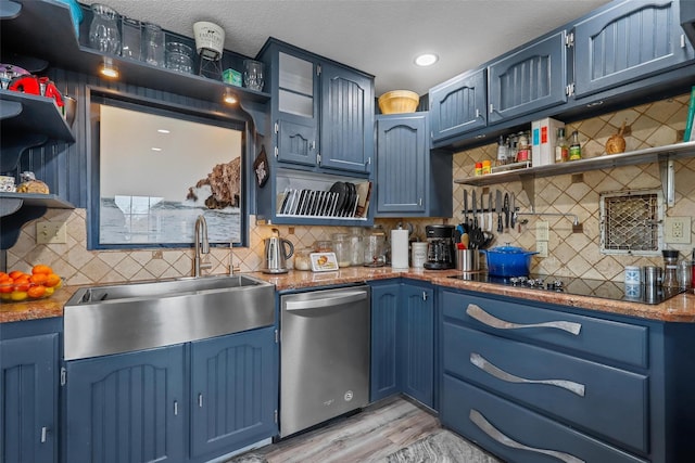 kitchen with sink, stainless steel dishwasher, blue cabinetry, and decorative backsplash