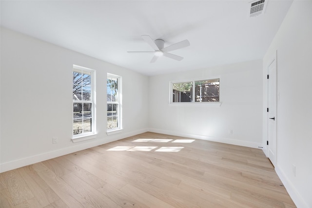 unfurnished room featuring ceiling fan and light hardwood / wood-style flooring