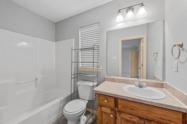 full bathroom featuring a healthy amount of sunlight, vanity, toilet, and bathing tub / shower combination