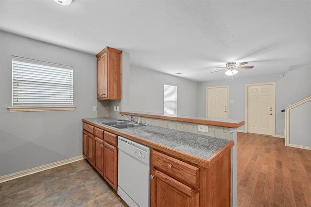 kitchen featuring sink, kitchen peninsula, dishwasher, and ceiling fan