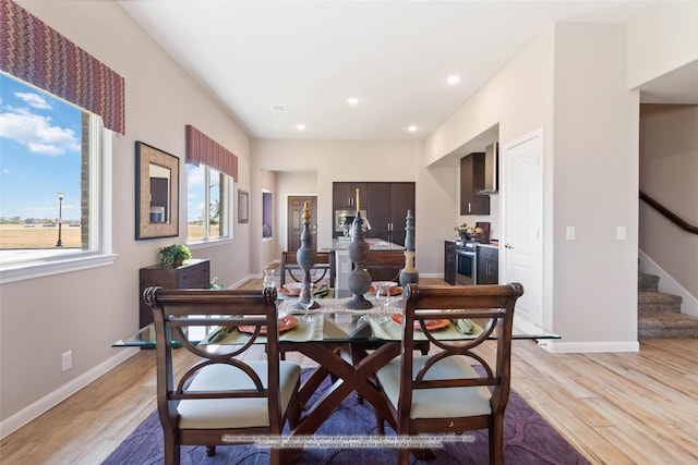 dining area featuring light hardwood / wood-style floors