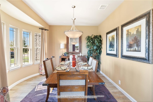 dining room featuring light wood-type flooring