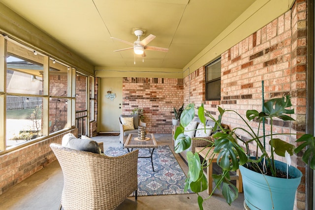 sunroom / solarium with ceiling fan