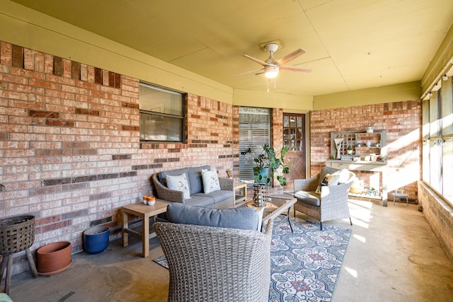 view of patio with ceiling fan and outdoor lounge area