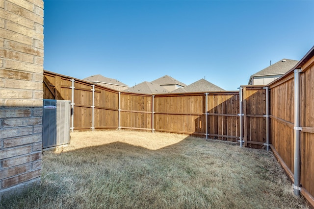 view of yard with central AC unit