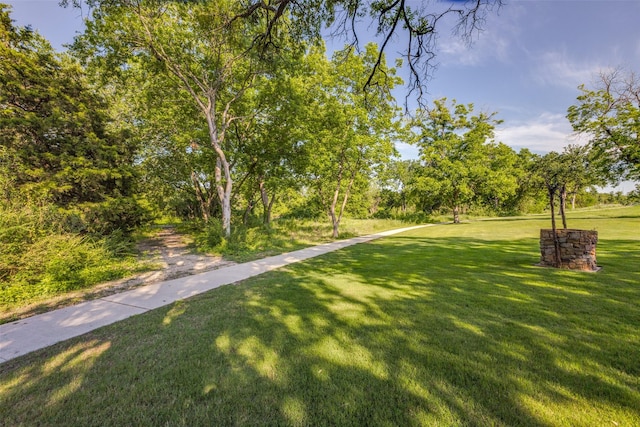 surrounding community featuring a lawn