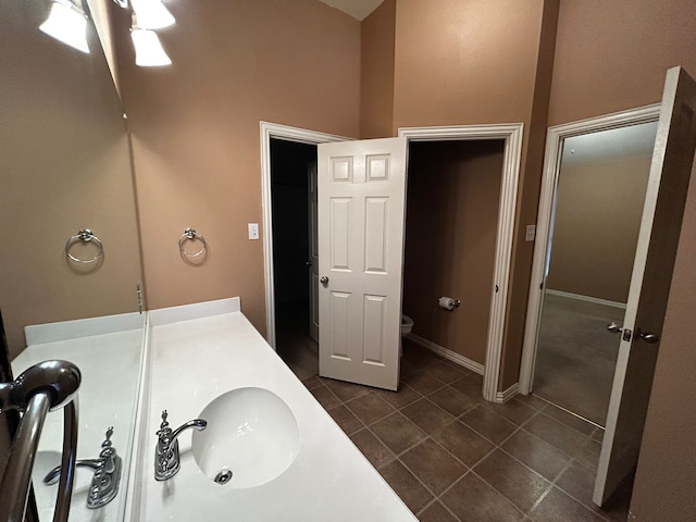 bathroom featuring tile patterned flooring and vanity